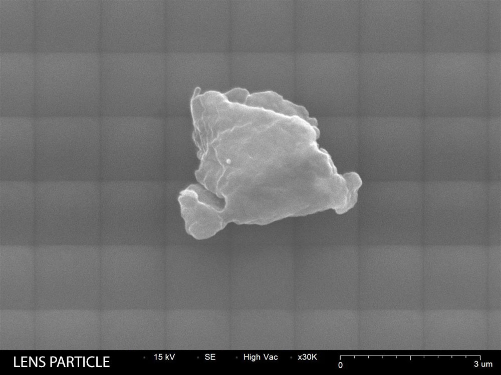 Camera Lens contamination particle SEM image 30,000X magnification